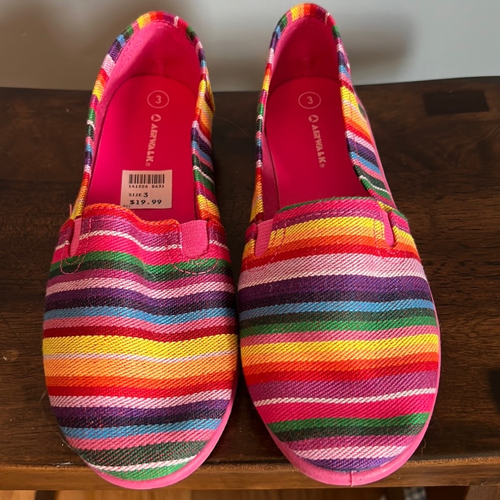 Rainbow colored flats by Air Walk